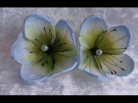 Видео: Цветы в прическу