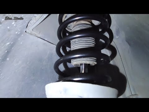 Видео: Замена пружины и верхней опоры передней стойки Opel Omega B
