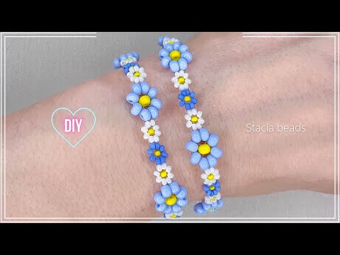 Видео: Как сделать простой браслет с ромашками из бисера ?