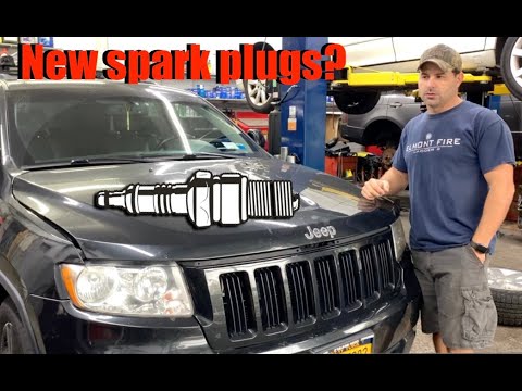 Видео: Как заменить свечи зажигания / Как заменить прокладку впускного коллектора Pentastar? Jeep Grand ...