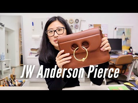 Видео: Распаковка и обзор сумки JW Anderson Pierce