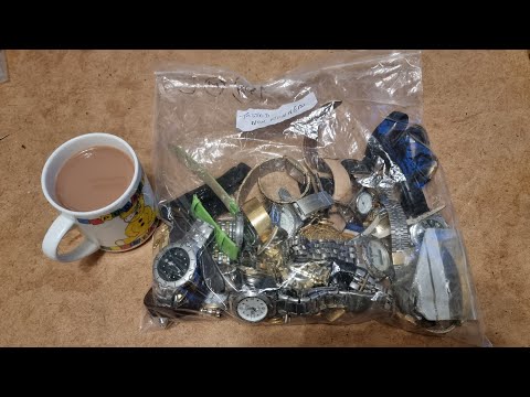 Видео: Я заплатил 10 фунтов за эту сумку с часами, посмотрим, что мы получим.