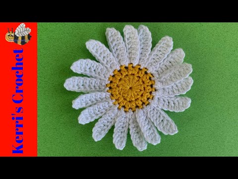 Видео: Учебник по вязанию ромашки крючком - Учебник по аппликации крючком