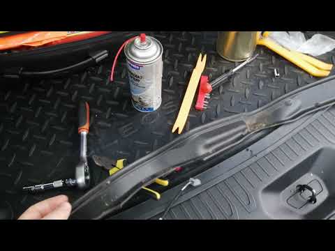 Видео: Разбор двери багажника Renault Koleos II