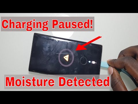 Видео: Ошибка зарядки Samsung Note 10: простое решение. Зарядка приостановлена ​​из-за обнаружения влаги.