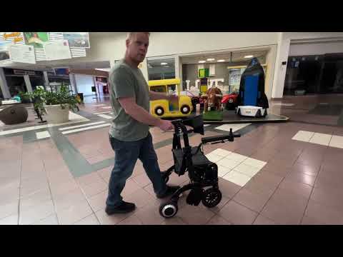 Видео: Возьмите с собой в торговый центр Wheellator Power Walker