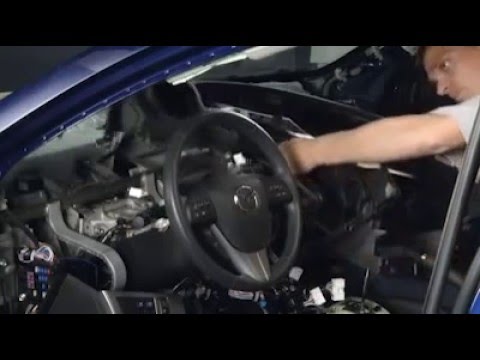 Видео: Снятие приборной панели Mazda 3