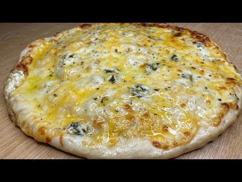 Видео: Как приготовить пиццу 4 сыра в домашних условиях
