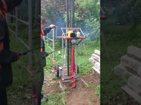 Видео: Бензобур  Iron Mole E73 со стойкой для бурения лунокзабор,фундамент Часть 2