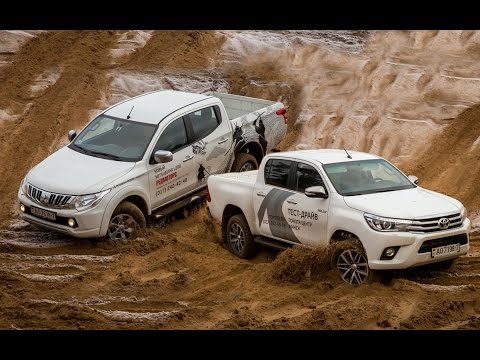 Видео: Toyota Hilux и Mitsubishi L200