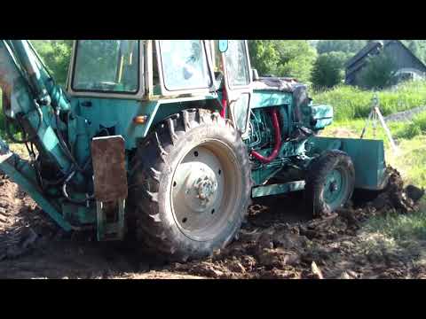 Видео: Работа бульдозерным отвалом на ЮМЗ (ЭО-2621)