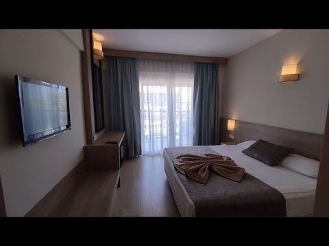 Видео: Обзор комнаты в отеле Lucida Beach Hotel 5* / Турция Чамьюва