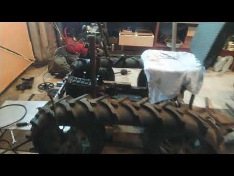 Видео: Самодельный гусеничный трактор часть 3, установка КПП и тормозов