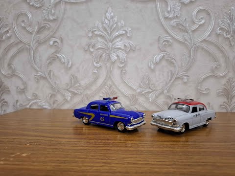 Видео: Обзор на масштабную модель газ 21 волга.