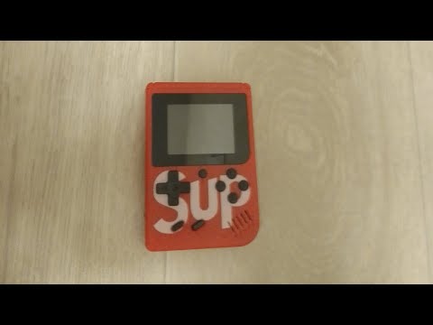 Видео: Обзор на игровую консоль Sup