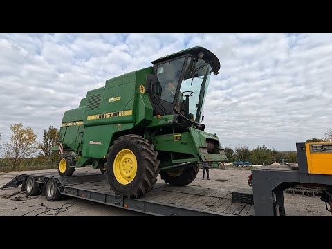 Видео: Негабаритний John Deere 1157 — перевезення через 3 області! | доставка, затори і ночівля в дорозі