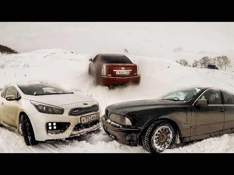 Видео: Передний, задний и полный привод в снегу! КИА, БМВ и Кадиллак