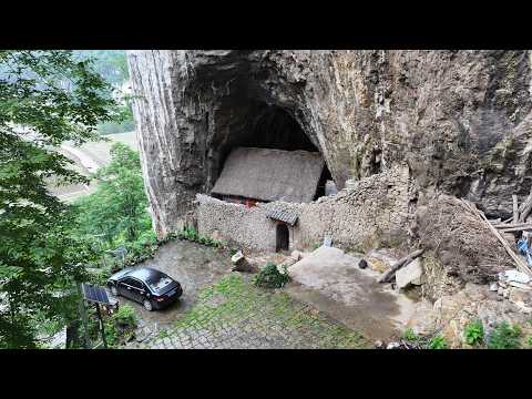 Видео: Семья Гуйчжоу жила одна в пещере более 300 лет. Если подойти ближе, то она покажется раем.