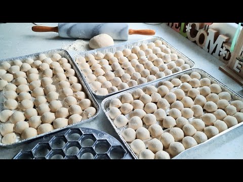 Видео: Wie macht man schnell viele PELMENI russische FLEISCHTASCHEN Rezept 🍴ПЕЛЬМЕНИ очень быстро зделать