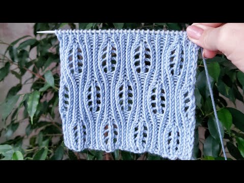 Видео: Шикарный ажурный узор на основе резинки 1 на 1 с лицевыми скрещенными петлями