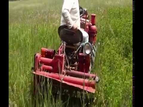 Видео: ТЗ-4К-14 с двигателем Д-21, работа с почвофрезой