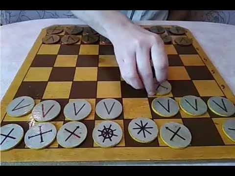 Видео: Урок 32. Таврели. Русские шахматы.