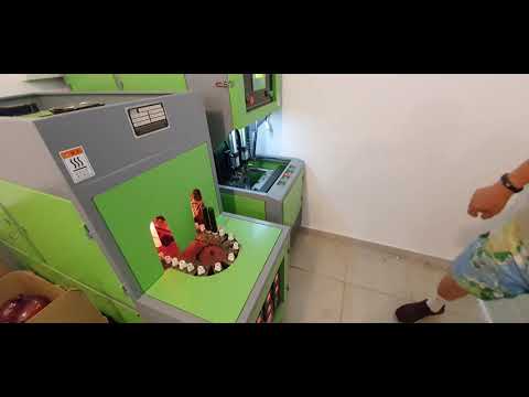 Видео: Обзор выдувной машины для ПЭТ бутылок.