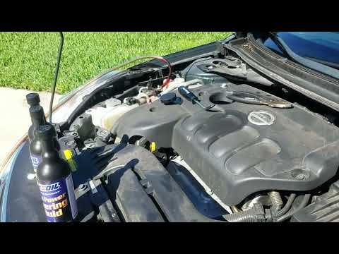 Видео: Жидкость для промывки гидроусилителя руля Nissan Altima 2010 года