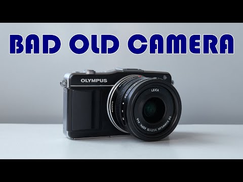 Видео: Olympus Pen Mini 2. Самый маленький Олик. Bad Old Camera