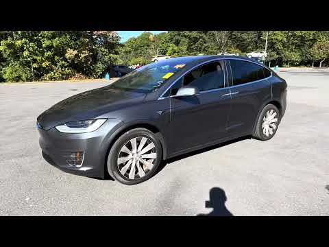 Видео: Tesla Model X Короткий обзор