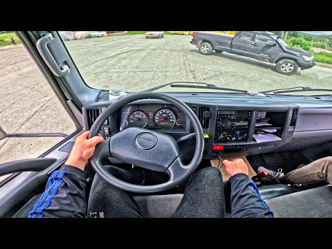 Видео: 2012 ISUZU Elf 5.2 MT - ТЕСТ-ДРАЙВ ОТ ПЕРВОГО ЛИЦА
