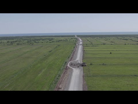 Видео: Строительство дороги до Халактырского пляжа продолжается