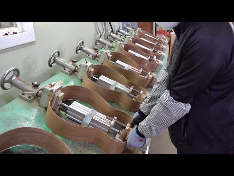 Видео: Как сделать массовую акустическую гитару. Удивительный завод по производству гитар