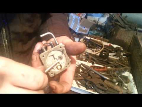 Видео: Ремонт карбюратора бензопилы урал кмп100 у