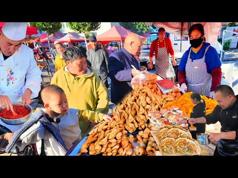 Видео: Вкусные блюда провинции Шаньси: блины, мясной суп и жареные булочки на ярмарке в храме Чанчжи