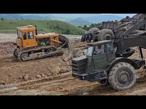 Видео: Строительство пруда самоходными скреперами МоАЗ Д-357П