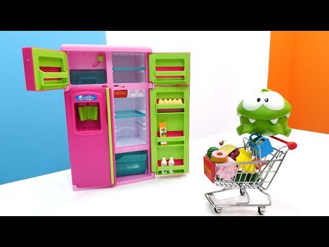 Видео: Игры Ам Няма - Игрушка Ам Ням идет в магазин.