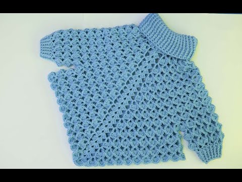 Видео: ПОНЧО С ВЯЗАНЫМИ КРЮЧКАМИ РУКАВАМИ И ВОРОТНИКОМ