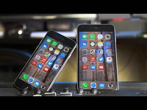 Видео: iPhone 6 против iPhone 6 Plus