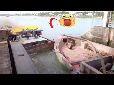 Видео: [673] Небольшая баржа совершила впечатляющий побег через ворота плотины.