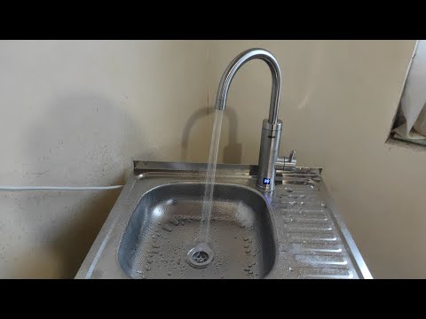 Видео: Отзыв и как работает Водонагреватель проточный для кухни Zanussi SmartTap Fresh 3.3 кВт