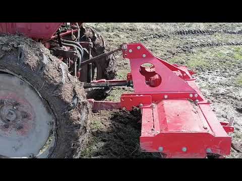 Видео: Испытания китайской почвофрезы в поле в целине