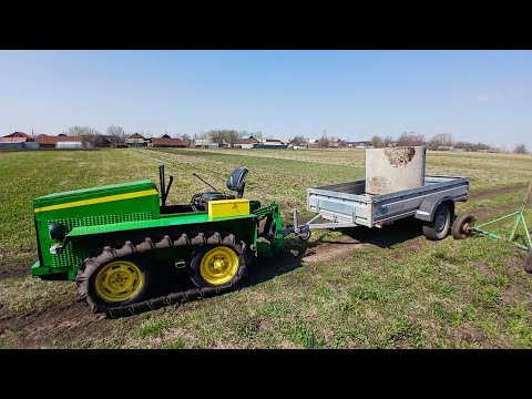 Видео: Гусеничный минитрактор снова помогает! Перевозим колодезное кольцо.
