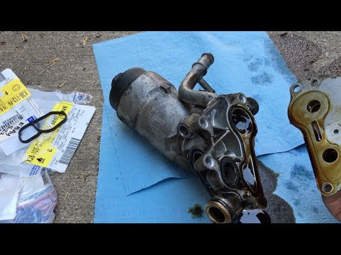 Видео: 2011 chevy cruze удаление масляного радиатора (замена уплотнений) отключение турбонаддува, установка