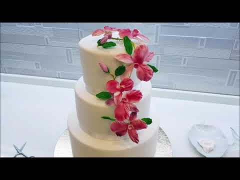 Видео: Как закрепить цветочную композицию на торте