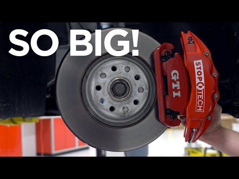 Видео: 2018 VW GTI (MK7.5) — мы установили ОГРОМНЫЕ тормоза