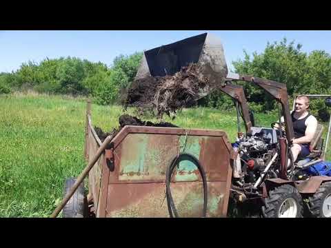 Видео: грузим ковшом .лень вилы цеплять .4×4 мини трактор .переломка