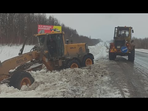 Видео: Автогрейдер в Снежном Плену. Вытащили!
