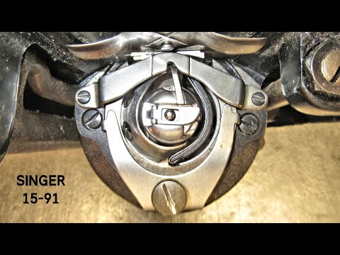 Видео: Как снять и установить челнок/шпульный колпачок на машине Singer модели 15-91