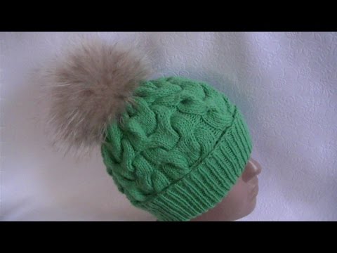 Видео: Вязание шапки по кругу узором  объемные косы.Knitting hats in a circle pattern voluminous tresses